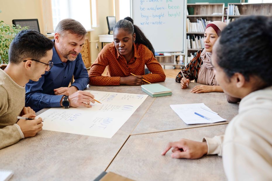 teacher-working-with-group-of-migrants-2023-11-27-05-14-27-utc (1).jpg